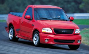 Second-Generation-Ford-Lightning-vibrant-red-truck-on-track-Oklahoma-City