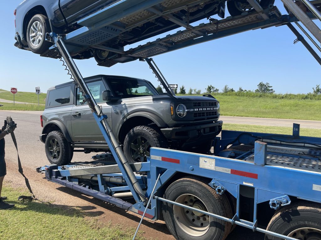 a new ford bronco on a trailer